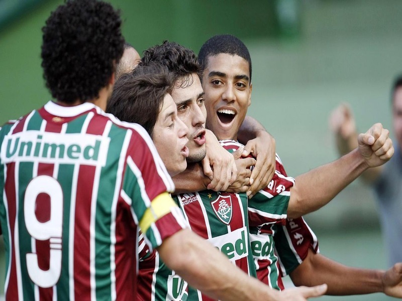 Jogadores do Fluminense comemoram em 2009 - Foto: Photocamera - Reprodução: Site do Fluminense